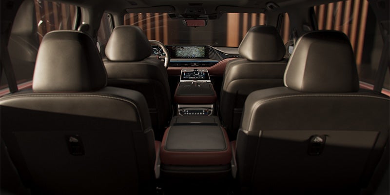 view from the rear of 2025 INFINITI QX80 front and back seats